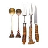 An Alpine cutlery and oriental spoons