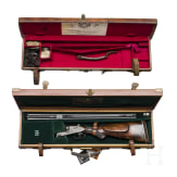 A Holland & Holland "Royal" side-by-side rifle, with two cases