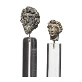 Zwei Bronzek&ouml;pfe von Statuetten, r&ouml;misch, 2. - 3. Jhdt.