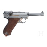 A Luger pistol by DWM, "First Issue", with holster