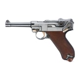 A Luger pistol by DWM, "First Issue", with holster