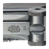 A Luger pistol by DWM, 1914, police, with holster