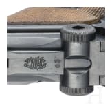 An Artillery Luger by DWM, 1914, "EWB" marking, with shoulder stock and holster