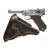 A Luger pistol by DWM, 1915, with holster