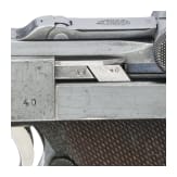 A Luger pistol by DWM, 1915, with holster