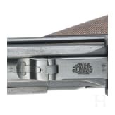 A Luger pistol by DWM, 1915, with holster