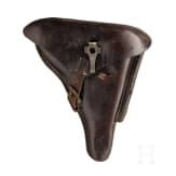 A Luger pistol by DWM, 1915, with holster