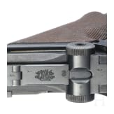 A Luger pistol by DWM, 1916, with holster