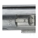 A Luger pistol by DWM, 1917, with holster