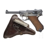 A Luger Pistol by DWM, 1918, with holster
