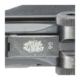 A Luger pistol by DWM, 1918, "Lazy S Death's Head"