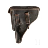 A Luger pistol by Mauser, code "K - S/42", with two matching-number mags and holster