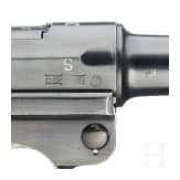 A Luger pistol by Mauser, code "K - S/42", with two matching-number mags and holster