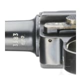 A Luger pistol by Mauser, code "K - S/42", with two matching-number mags and holster