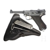 A Luger pistol by Mauser, code "K - S/42", with two matching-number mags and holster