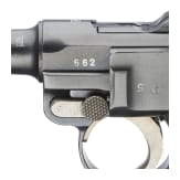 A Luger pistol by Mauser, code "K - S/42", with two matching-number mags and holster