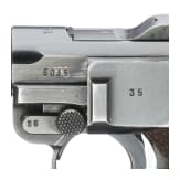 A Luger pistol by Mauser, code "1937 - S/42", with holster