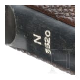 A Luger pistole by Mauser, code "1938 - S/42", 2 matching magazines, holster; Kriegsmarine