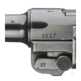 A Luger pistol by Mauser, code "1939 - 42", with holster