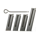 Four magazines for an FN Mod. 1903, cleaning rod
