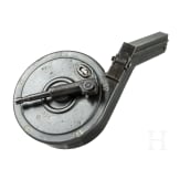 A snail drum magazine, fist pattern, for a Luger pistol, by AEG Berlin