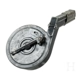 A snail drum magazine, new pattern, for a Luger pistol, by Bing in Nuremberg, with dust cover
