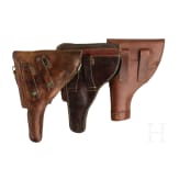 Three handgun holsters