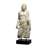 A Roman marble statue of Hermanubis with features of Alexander the Great, 1st - 2nd century