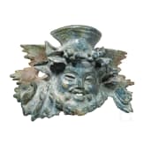 A Roman furniture fitting with the head of Bacchus, 1st - 2nd century