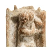 A Roman terracotta figure of the sleeping Eros, 2nd - 3rd century