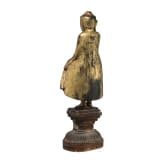 A Burmese sculpture of a standing Buddha, circa 1900