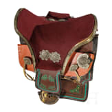 A richly decorated Sino-Tibetan saddle, 20th century