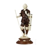 A silver-mounted ivory and boxwood figure of a winemaker in the manner of Simon Troger, late 19th century