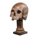 An Italian terracotta memento mori skull, 17th/18th century