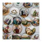 A collection of German porcelain plaques for beer mug lids, mid-19th century