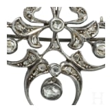 A gold-mounted art nouveau silver brooch set with diamonds