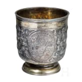 A partially gilt Russian silver pedestal beaker, Moscow, Michail Maximow Kluchin, 1738