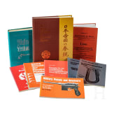 Three books and seven booklets on handguns, in English, German and French