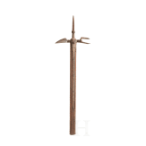 A collector's replica of a war hammer in the style of the 15th century