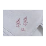 Seven monogrammed cloth napkins, circa 1900