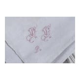 Seven monogrammed cloth napkins, circa 1900