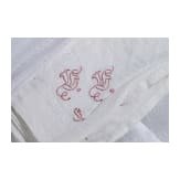 Seven monogrammed cloth napkins, circa 1900