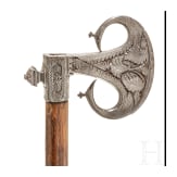 An Indian iron carved battle axe, 18th century