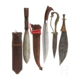 Four Asian and African knives, circa 1900 and later