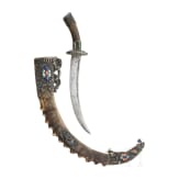 A magnificent Tibetan scimitar, 19th/20th century