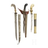 An Indonesian kris and two parangs, circa 1900