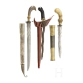 An Indonesian kris and two parangs, circa 1900