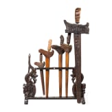 Five Indonesian kerises and a stand, 20th century