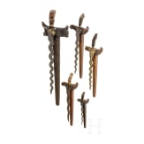 Five Indonesian kerises and a stand, 20th century