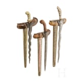 Three Indonesian kerises with handles of bone and wood, circa 1900